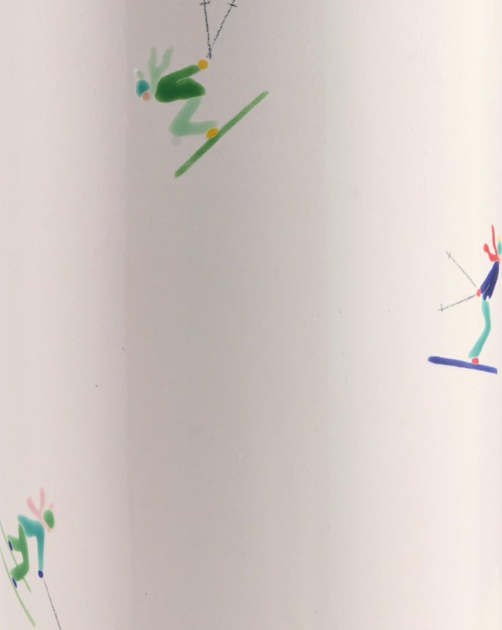 Illustrations of skiers on a white background of a wine cooler