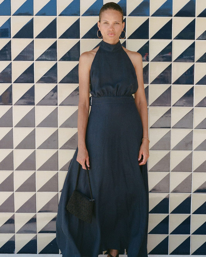 The Isi Halterneck Dress in navy blue