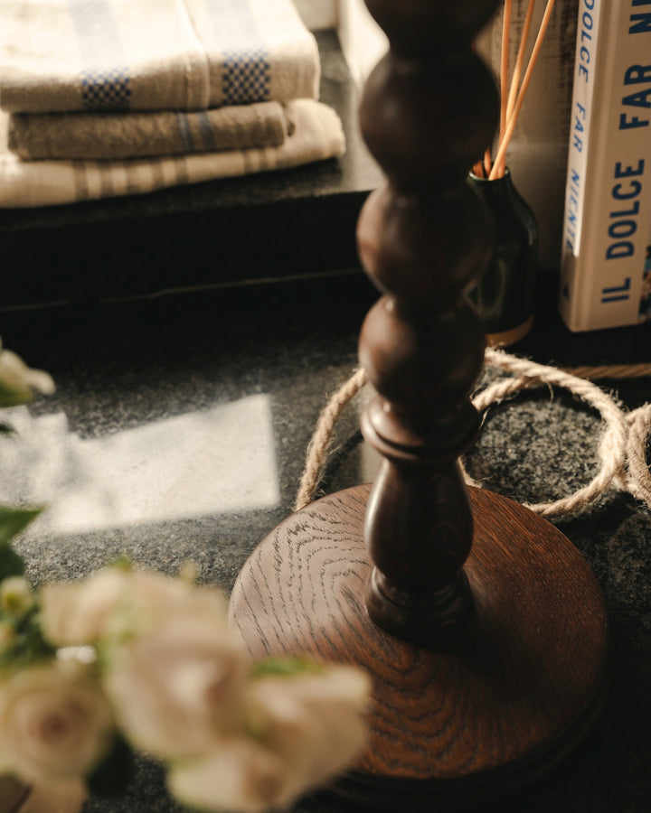 Wooden lamp base with a blurred background