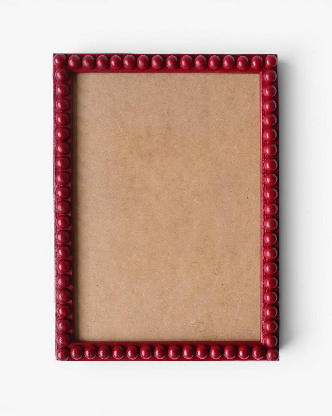 Red bobbin picture frame on a white background