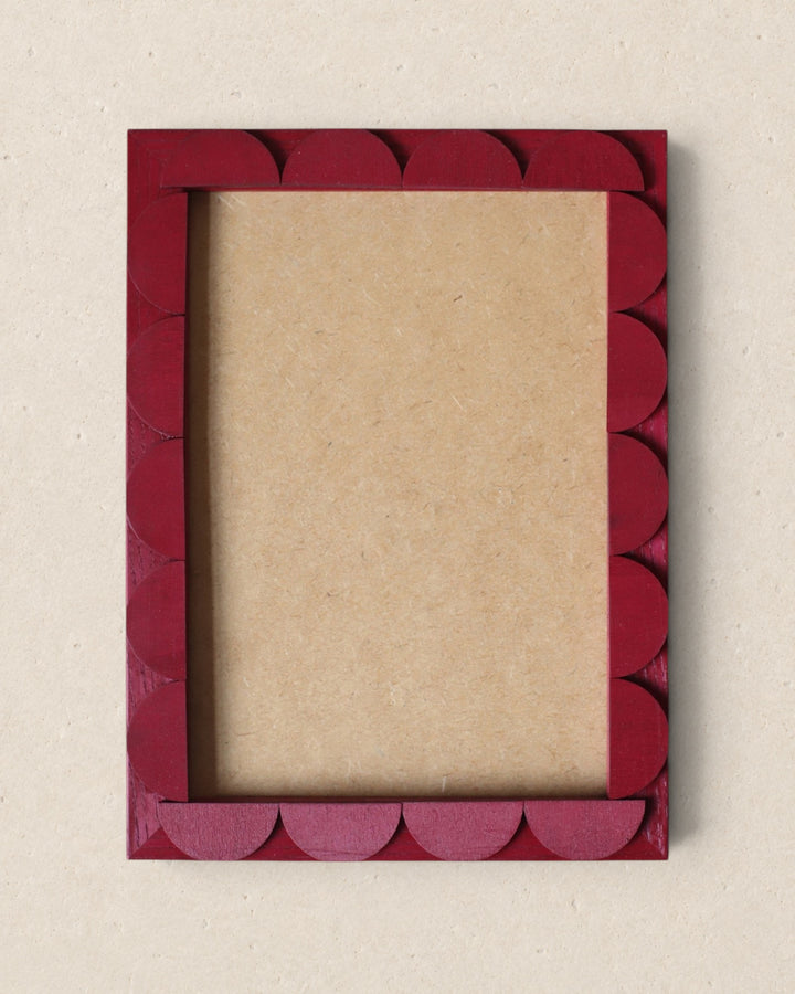 Red decorative frame on a beige background
