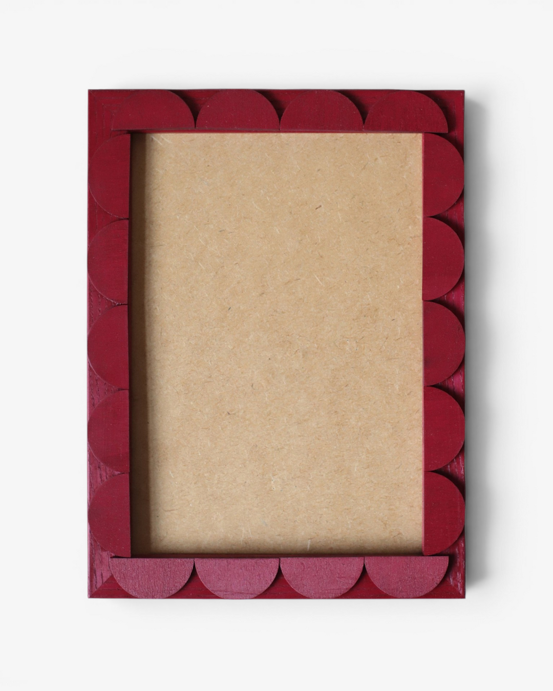 Red decorative scallop picture frame on a white background