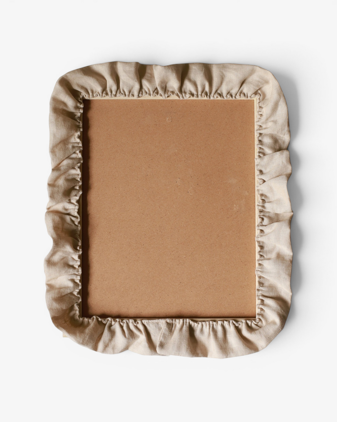 Beige ruffle photo frame on a white background