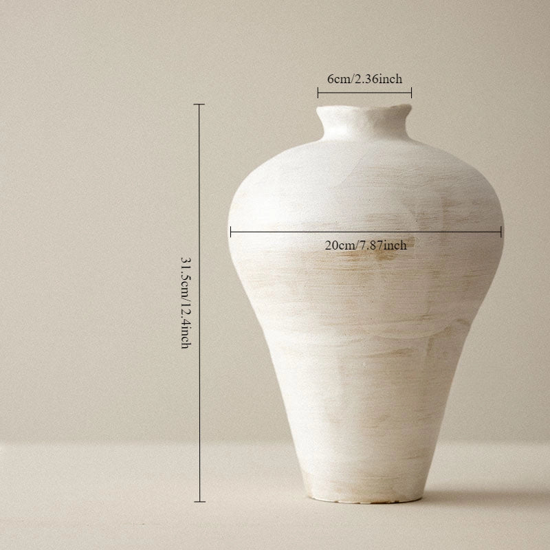 White ceramic vase with measurements on a beige background
