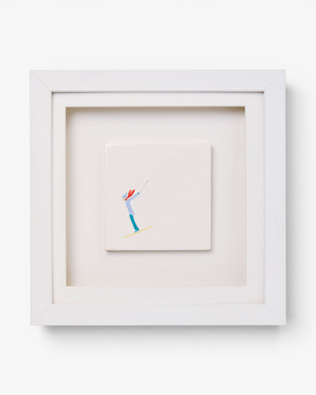 Framed artwork of a skier on a white background