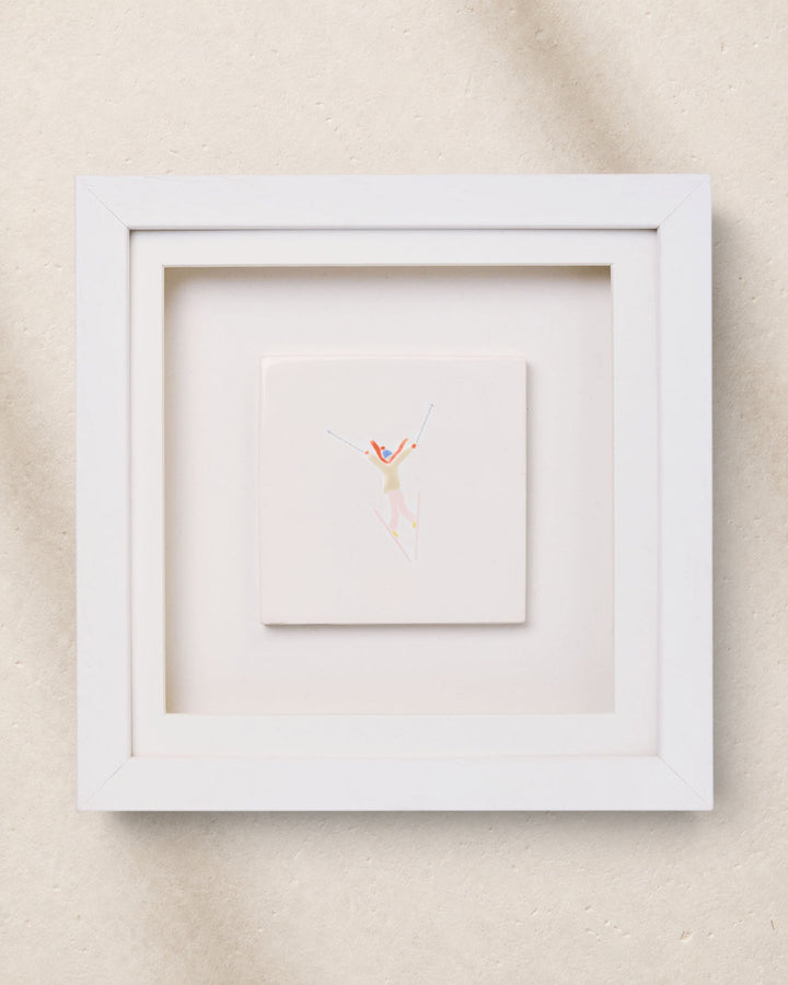 Framed artwork with a minimalistic design on a beige background