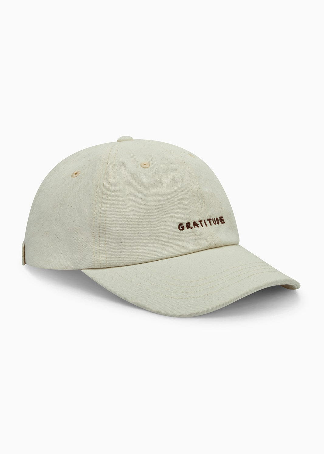 Off-white cap with 'Gratitude' embroidery on a white background
