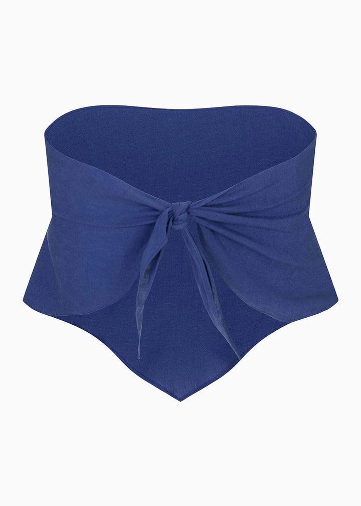 Blue bandeau top with a bow on a white background