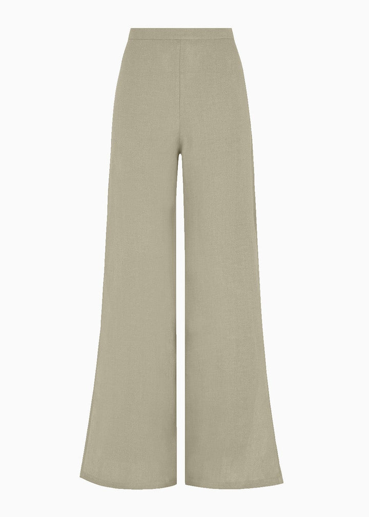 Pair of beige linen trousers on a light gray background