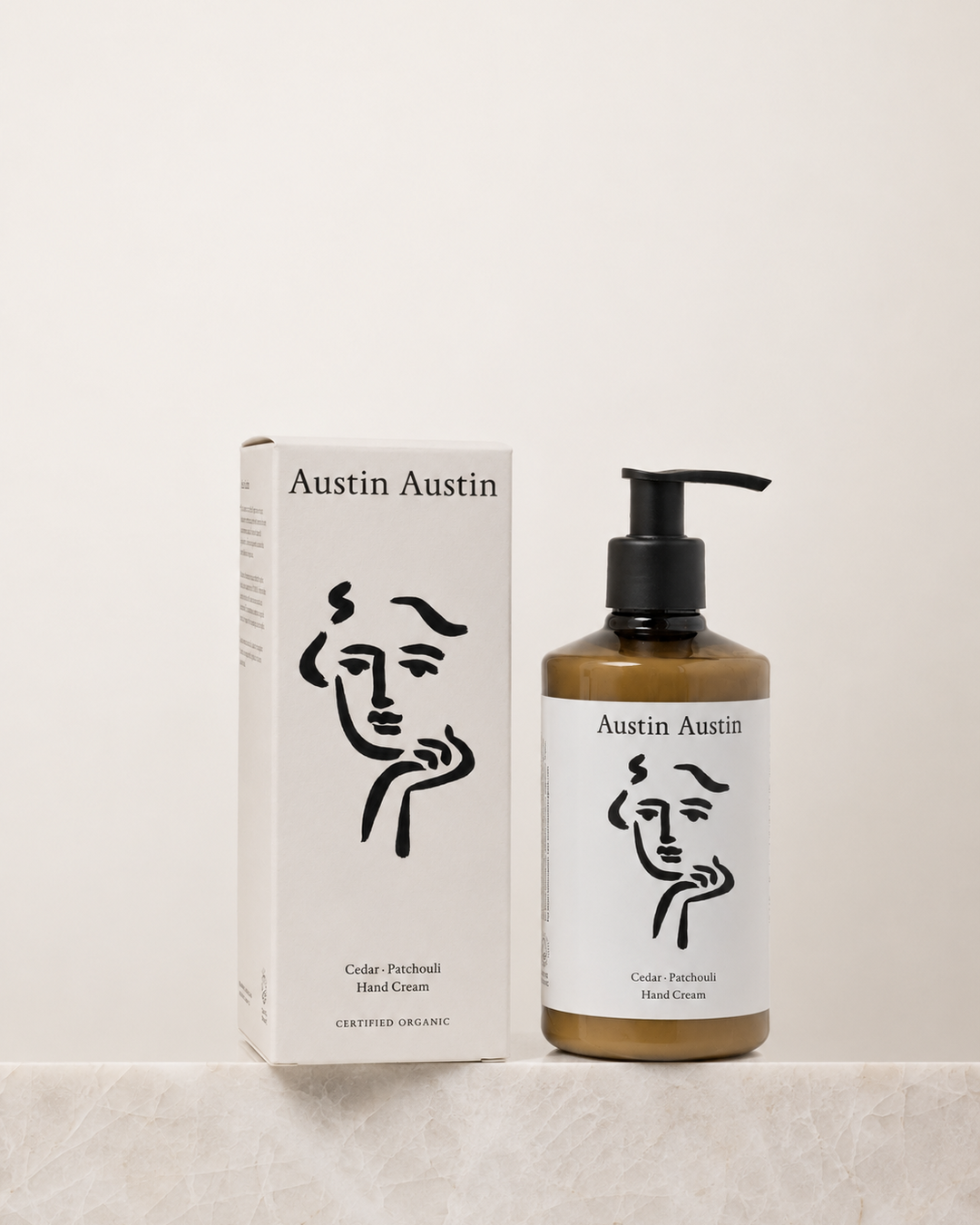 Austin Austin hand cream bottle and packaging on a beige background