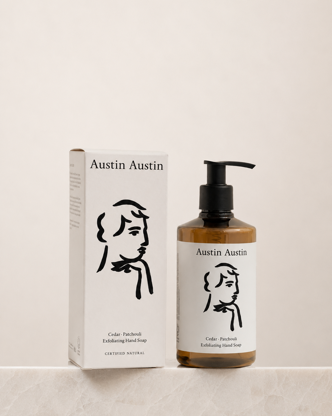 Austin Austin hand soap bottle and packaging on a beige background