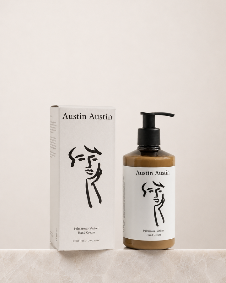 Austin Austin hand cream bottle and packaging on a beige background