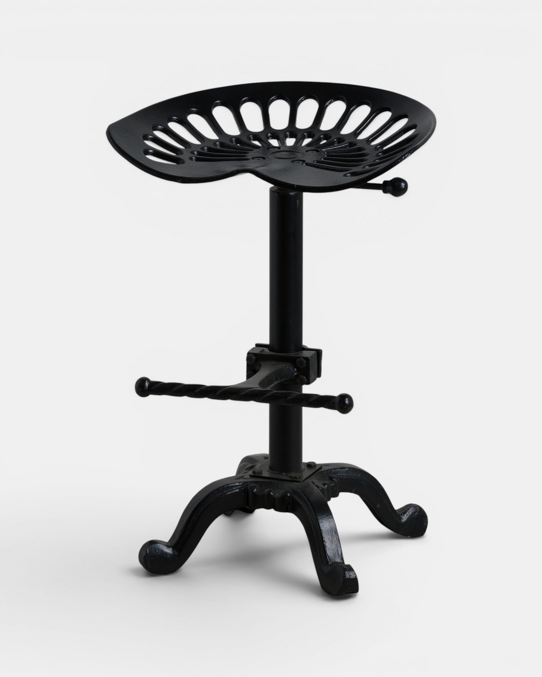 Black metal stool with adjustable height on a white background
