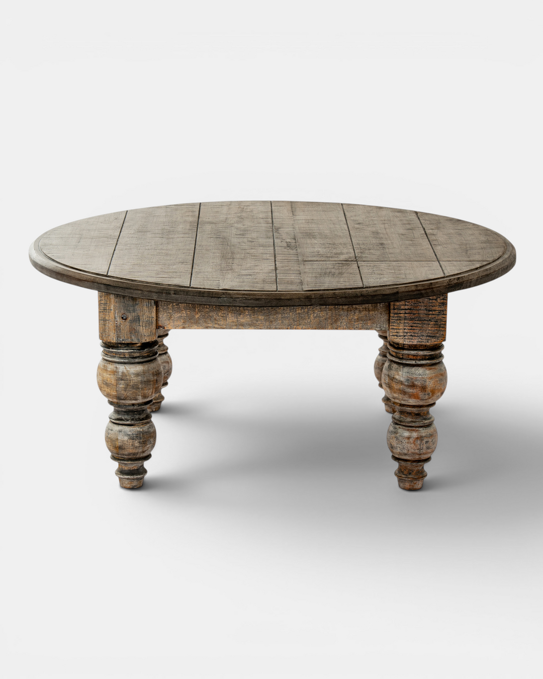 Round wooden table with turned legs on a white background