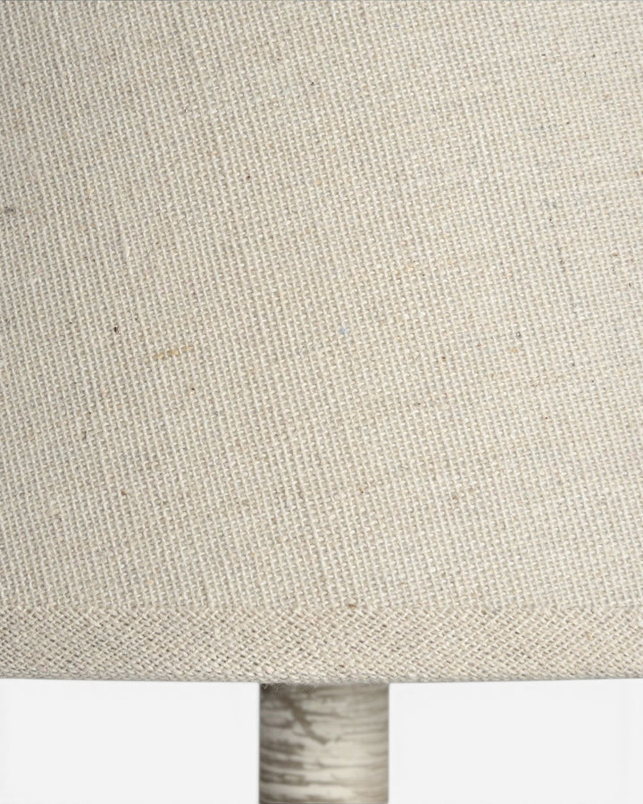 Close-up of a textured beige fabric lampshade