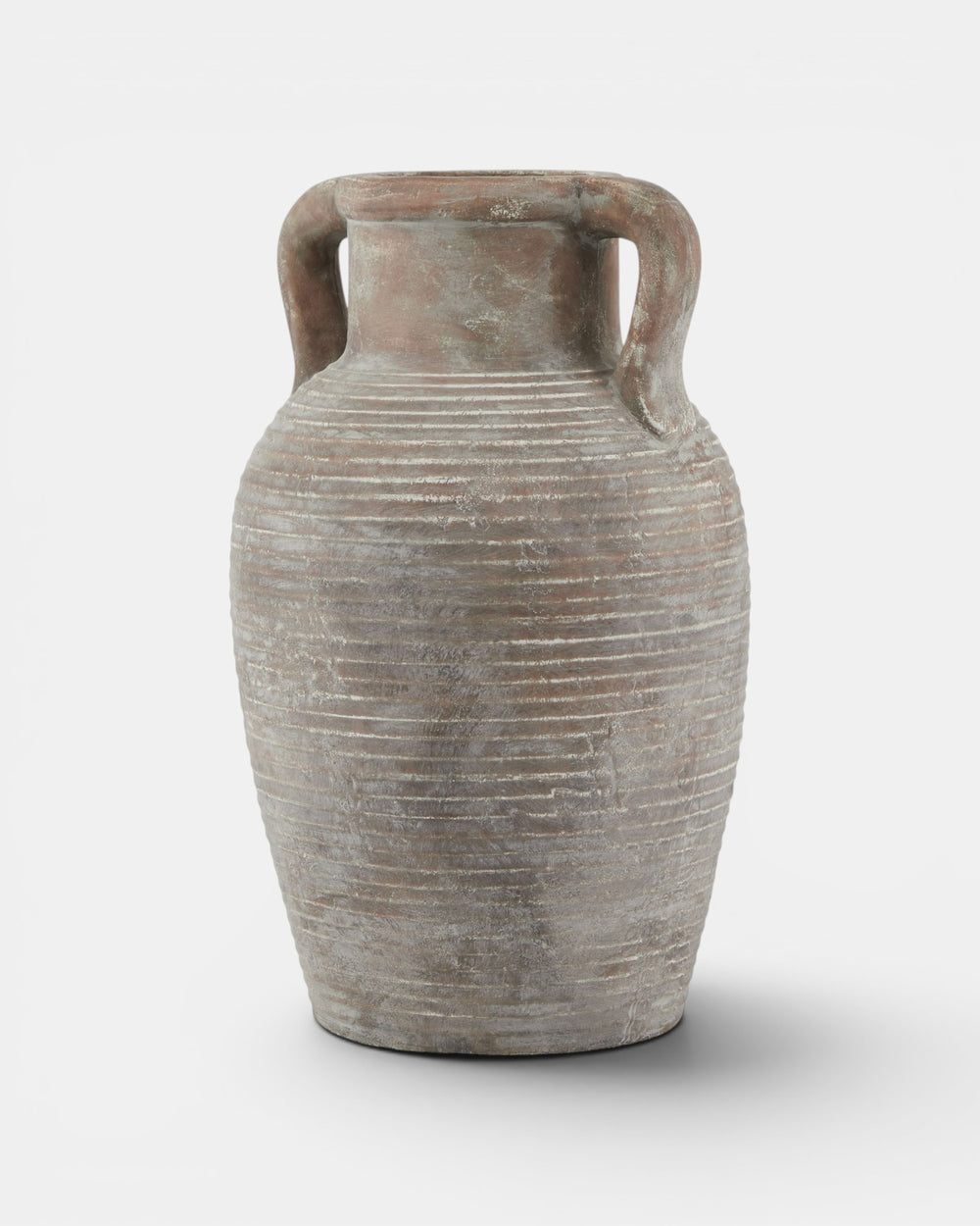 Terracotta vase with handles on a white background