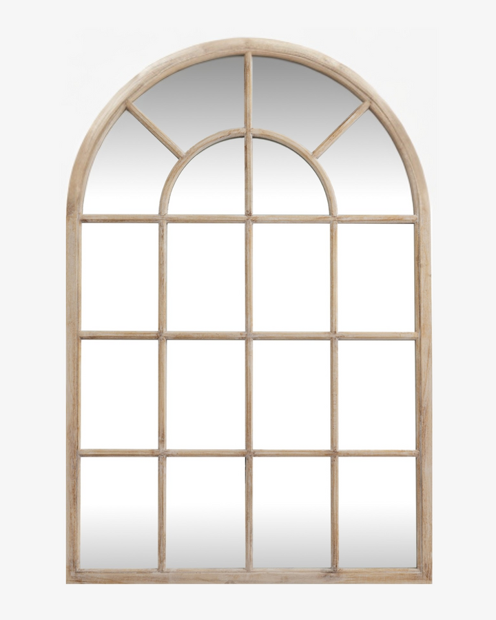 Arched window-style mirror with wooden frame on a white background