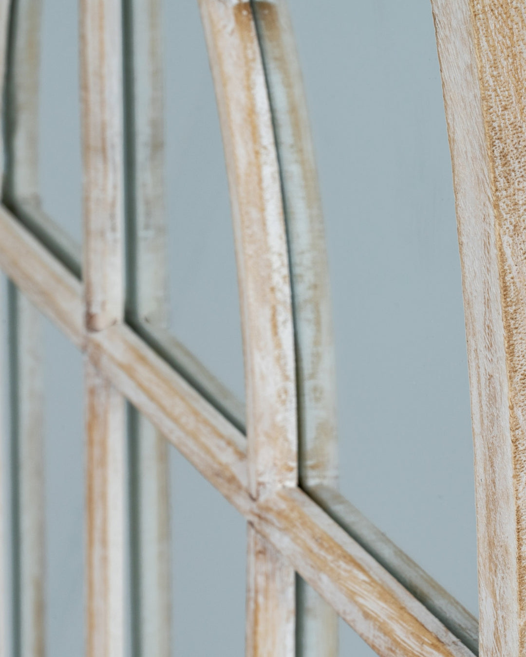 Close-up of a wooden mirror frame