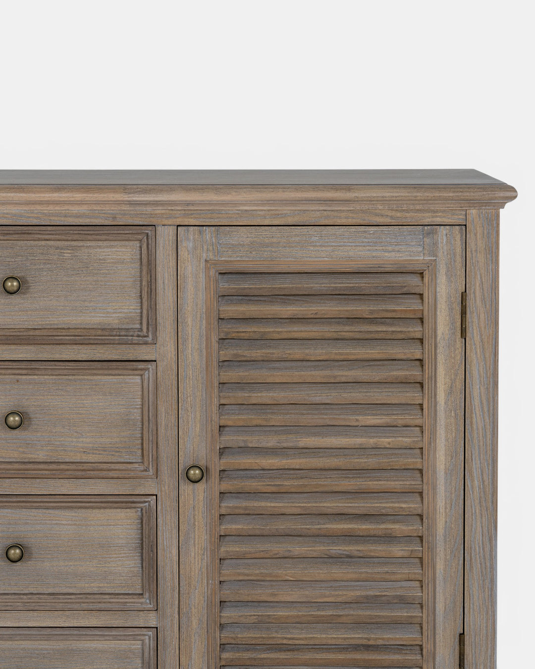 Wooden cabinet with drawers and a shutter door on a white background
