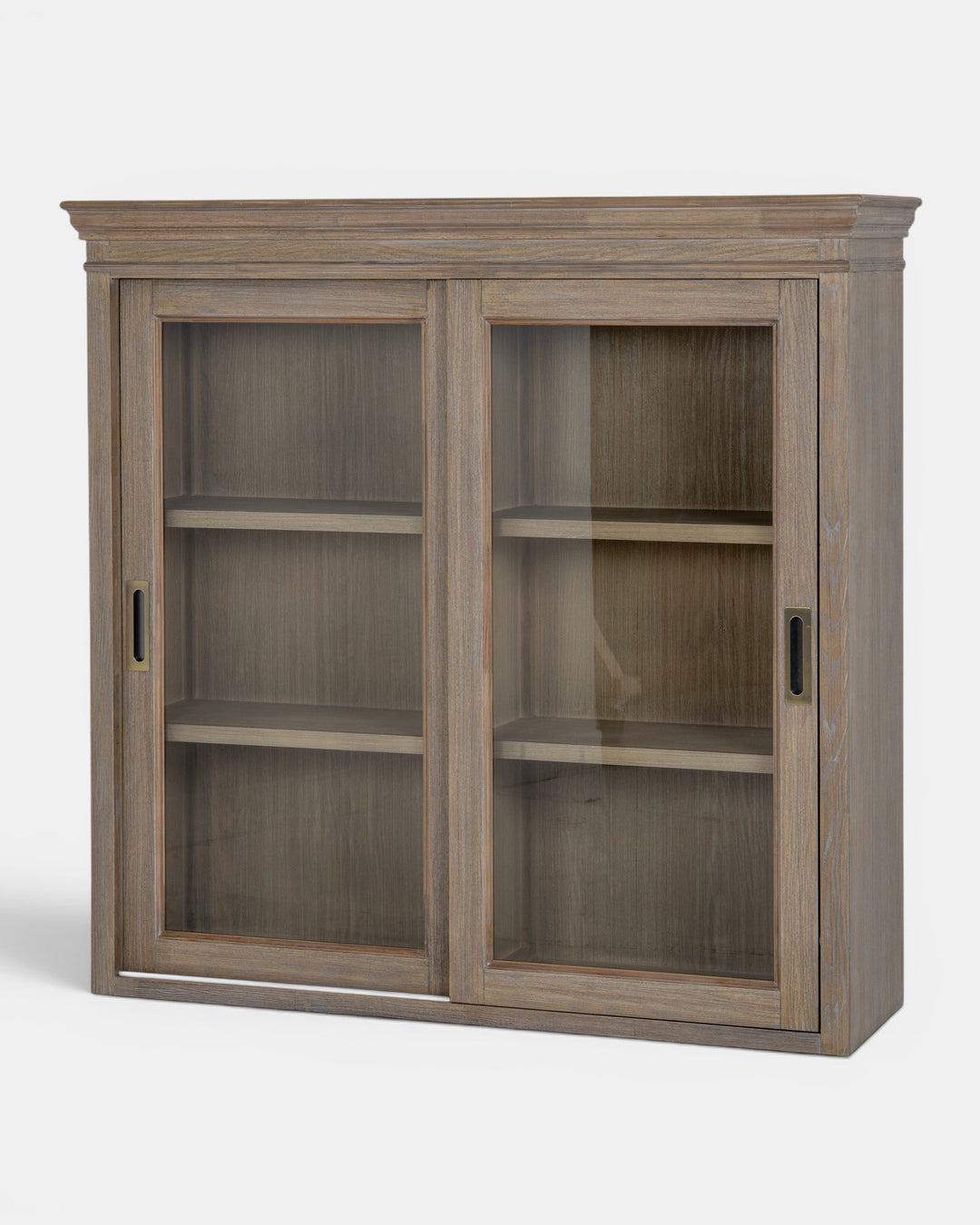 Wooden cabinet with glass doors on a white background