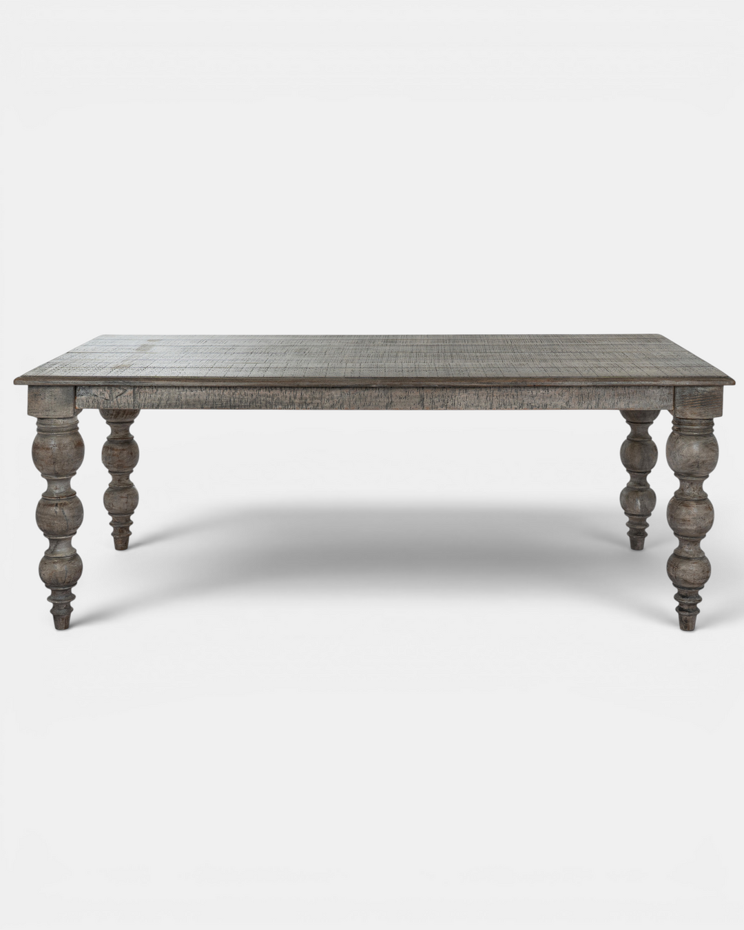 Wooden table with turned legs on a white background