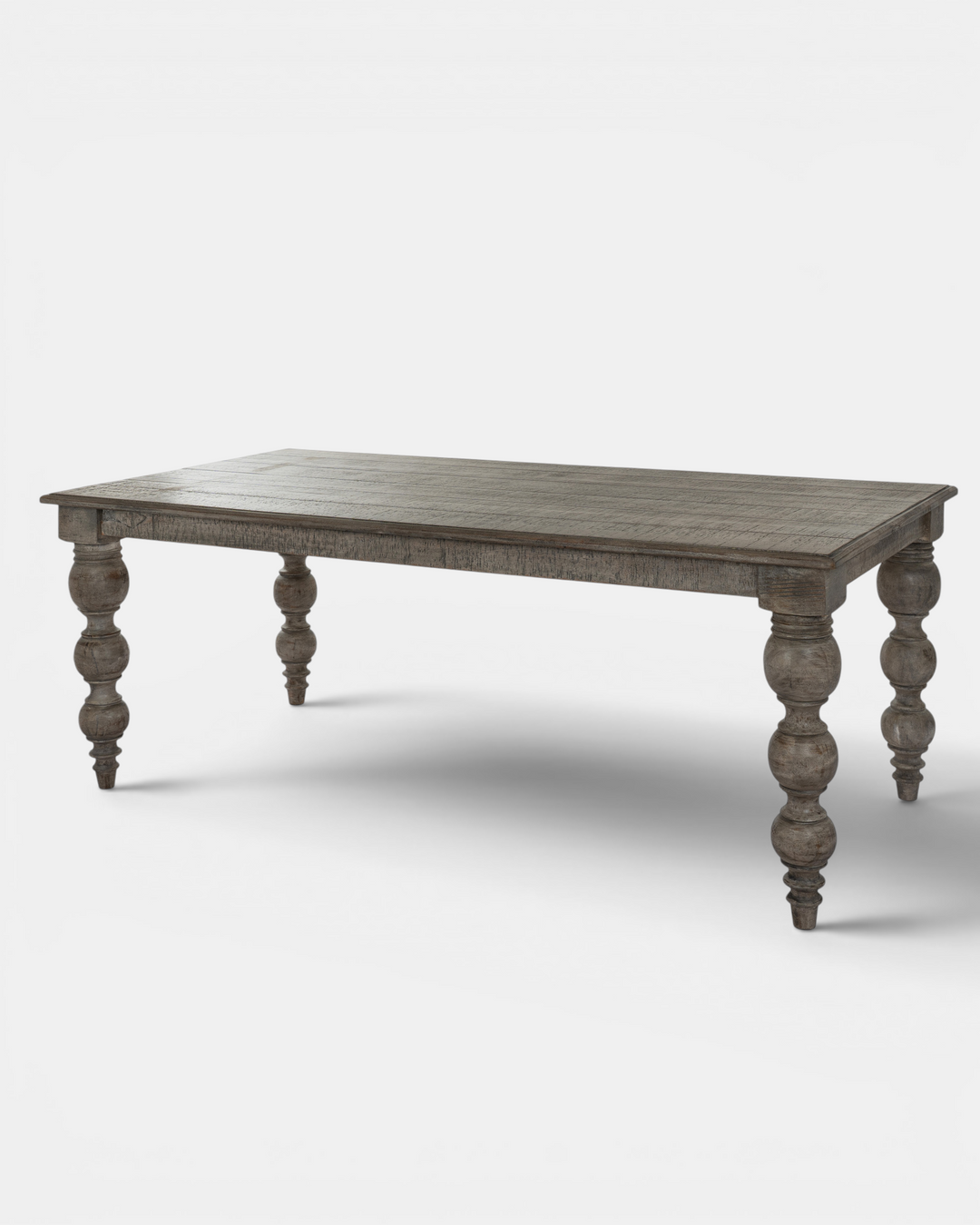 Wooden table with turned legs on a white background