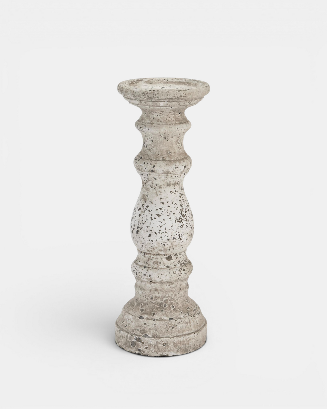 Beige candle holder with textured surface on a white background