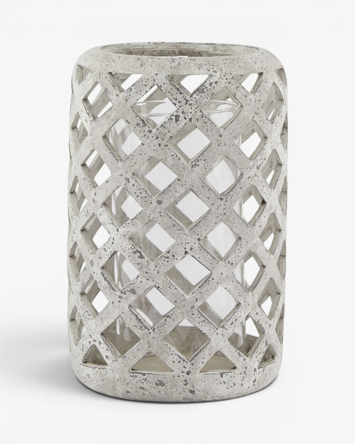 Concrete lantern with lattice design on a white background
