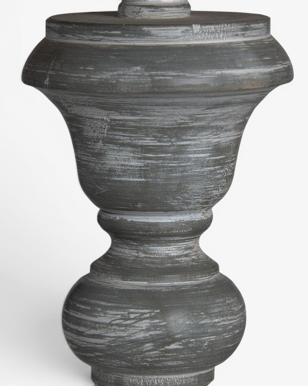 Close up of a decorative floor lamp on a white background