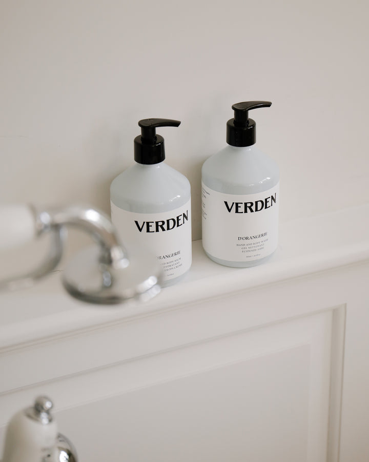 Two 'VERDEN' bottles on a bathroom counter with a white background