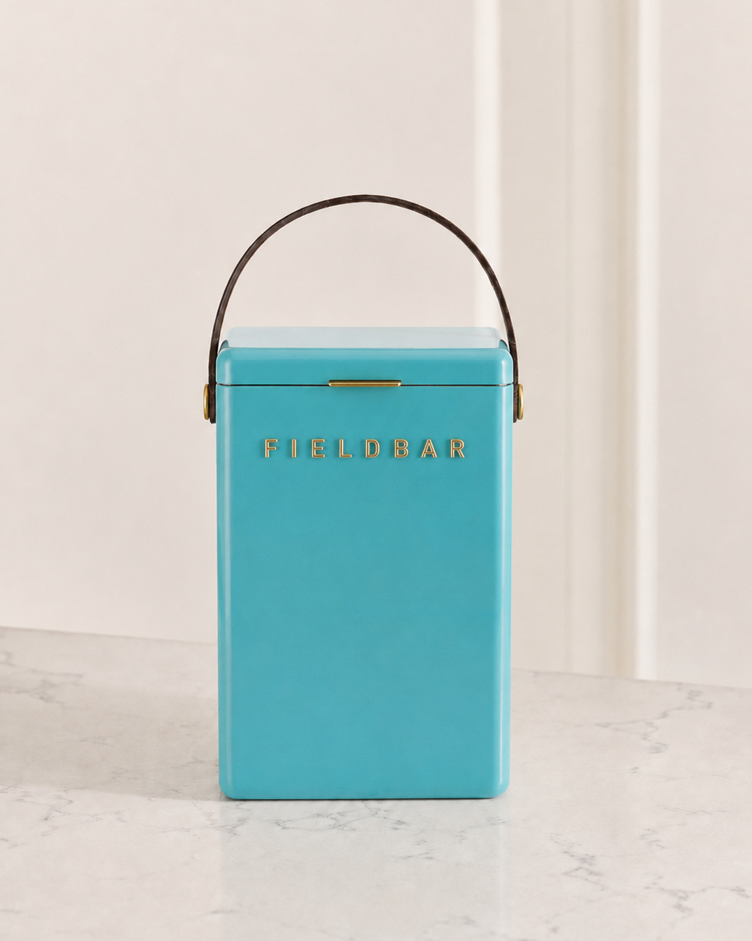 Turquoise cooler with 'FIELDBAR' branding on a light background