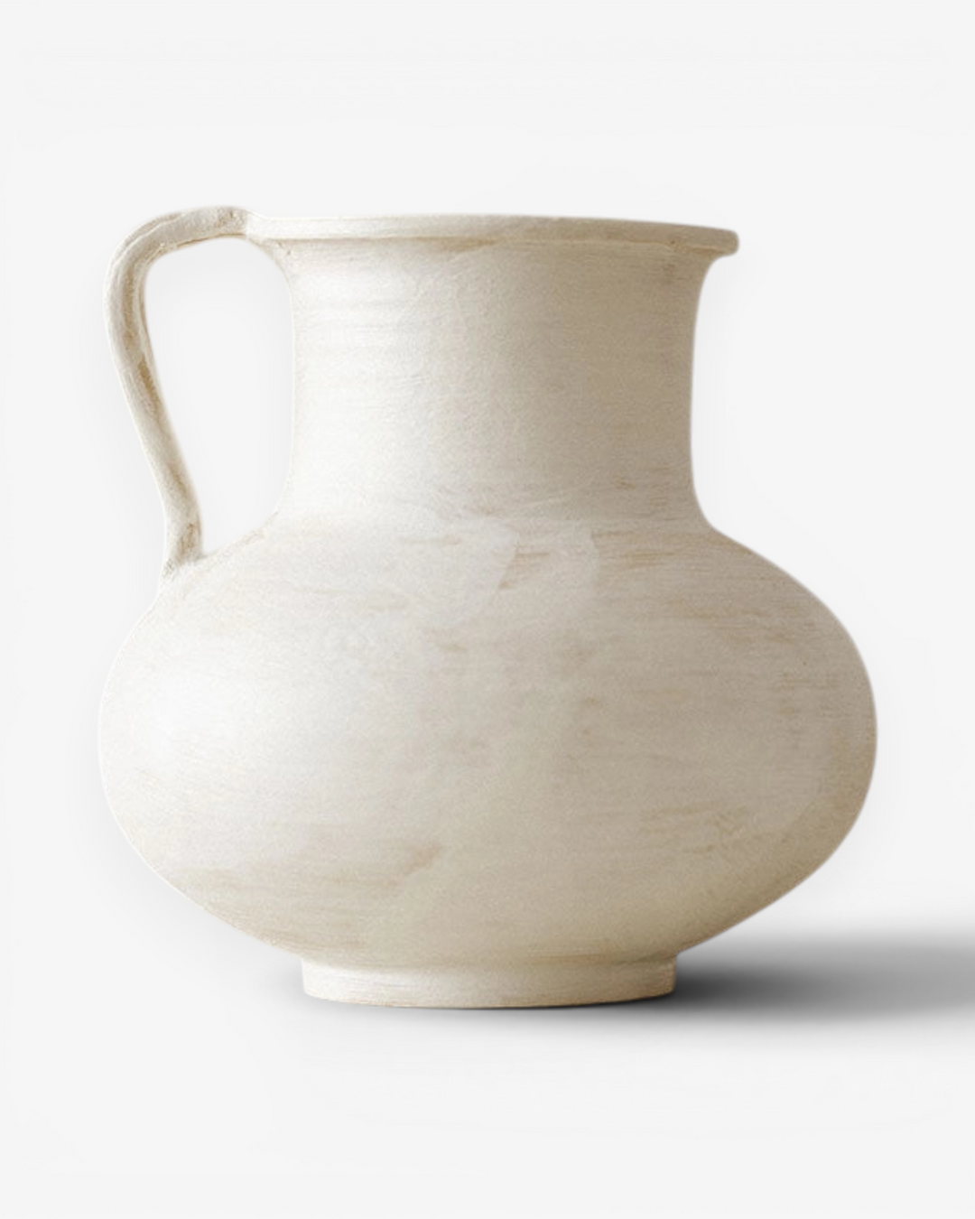 White ceramic vase on a white background