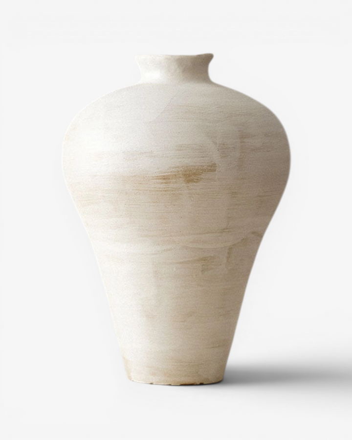 Beige ceramic vase on a white background