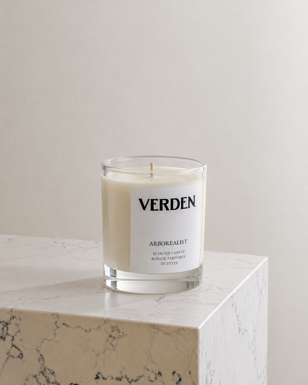 Verden candle on marble stand with neutral background