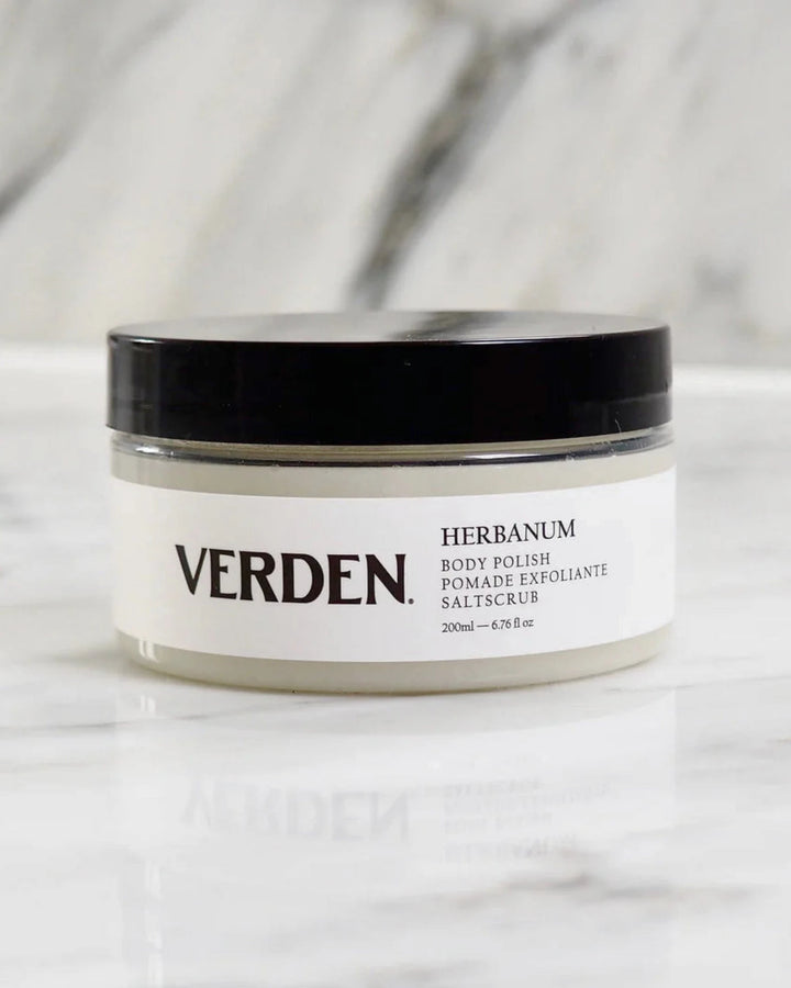 Verden Herbanum body polish jar on a marble surface
