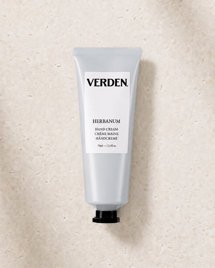 Verden hand cream tube on a textured beige background