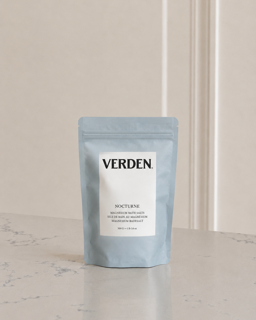 Verden Nocturne bath salt package on a marble surface with a neutral background